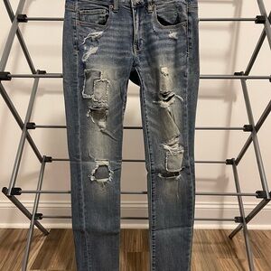 NWOT Women’s Size 2 American Eagle Distressed Ripped Blue Skinny Jeans